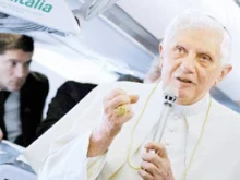 Pope Benedict speaks to reporters on the papal plane. 