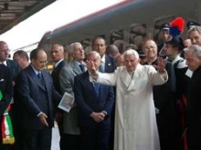 Pope Benedict XVI greets a crowd as he arrives in Assisi, Italy on Oct. 27, 2011. 
