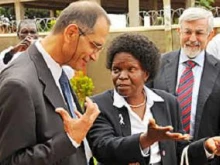 Dr. Filippo Ciantia (left) talks with Minister of Education Bitamazire