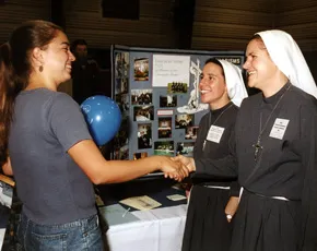A student talking to sisters at a vocation fair at Franciscan University?w=200&h=150