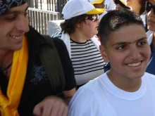 Palestinian youths wait for the arrival of Pope Benedict in Bethlehem