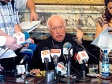 Archbishop Ricardo Ezzati announces the results of the Vatican investigation on Feb. 18. 