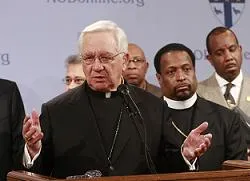 Cardinal Adam Maida and other faith leaders address the press?w=200&h=150