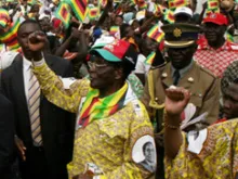 Robert Mugabe with his supporters