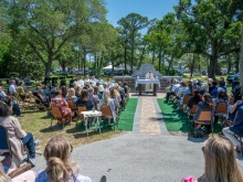 Families, donors, and others gather with Bishop Erik Pohlmeier for the dedication of the “Precious Ones Baby Mausoleum” at the San Lorenzo Cemetery in St. Augustine, Florida, on April 23, 2024.