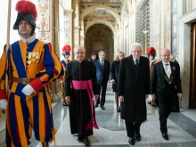 President Sergio Mattarella enters the Vatican for an audience with Pope Francis on Dec. 16, 2021.