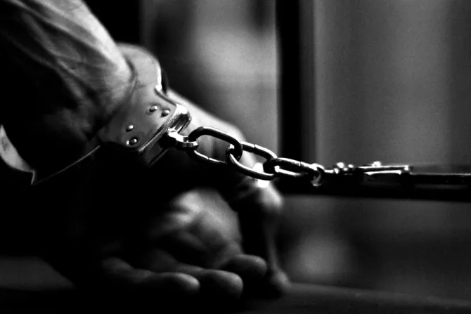 prison prisoner handcuffs Credit Matteo Parrini via Flickr CC BY NC SA 20 CNA 12 10 14