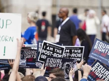 Participants in a pro-life rally hold signs in front of the Lincoln Memorial in Washington, D.C., on June 24, 2023, at a rally marking the first anniversary of the Supreme Court's Dobbs decision that overturned Roe v. Wade.