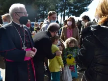 Bishop Eusebio Ignacio Hernández Sola of Tarazona welcomes a group of Ukrainian refugees to the diocesan seminary, March 13, 2022.