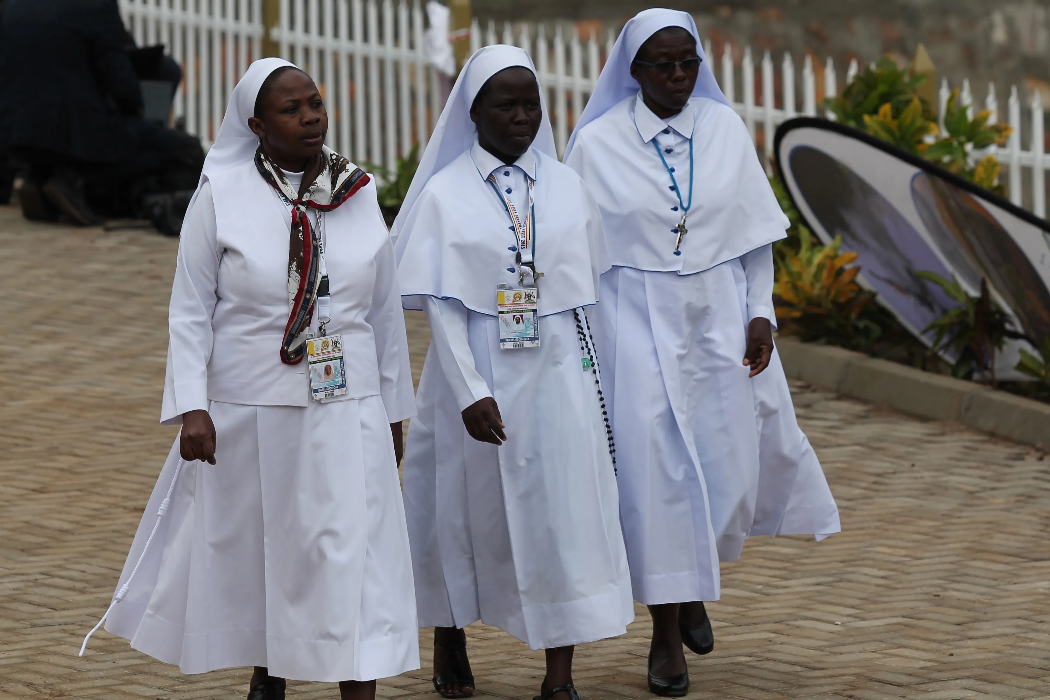 Three religious sisters attend Mass for the martyrs of Uganda on Nov. 28. ?w=200&h=150