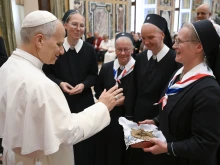 Pope Leo XIV greets Catholic pilgrims from Russia during an audience in the Vatican’s Apostolic Palace on Oct. 17, 2025.