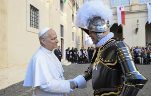 Pope Leo XIV greets a member of the Swiss Guard during a swearing-in ceremony at the Vatican, Saturday, Oct. 4, 2025. Credit: Vatican Media