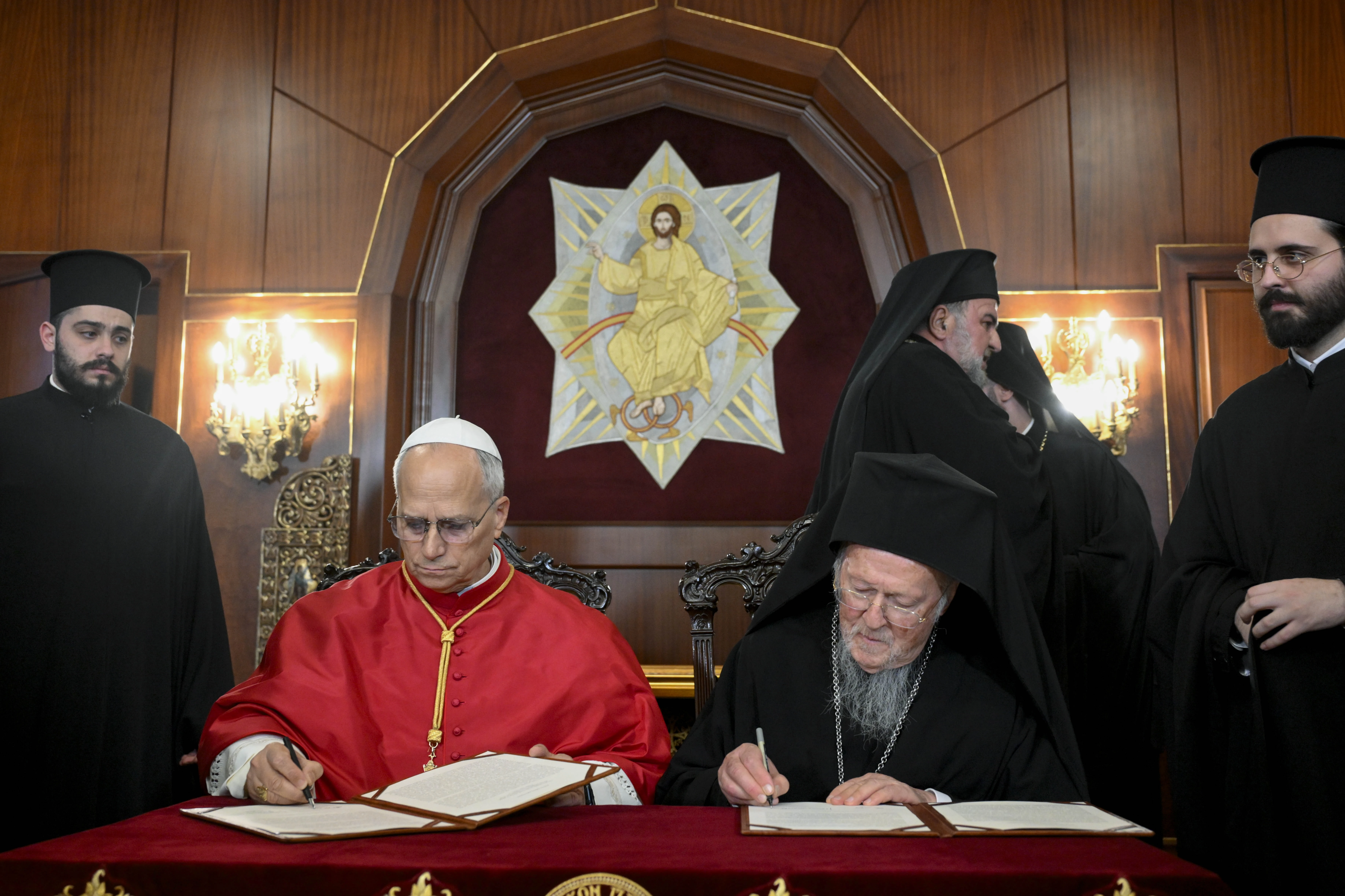 Pope Leo XIV and Ecumenical Patriarch Bartholomew I sign a joint declaration on Christian unity in Istanbul, Turkey, on Nov. 29, 2025. | Credit: Vatican Media.