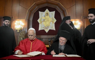Pope Leo XIV and Ecumenical Patriarch Bartholomew I of Constantinople sign a joint declaration at the Palace of the Ecumenical Orthodox Patriarchate in Istanbul, Turkey, on Nov. 29, 2025. Credit: Vatican Media