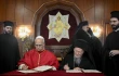 Pope Leo XIV and Ecumenical Patriarch Bartholomew I of Constantinople sign a joint declaration at the Palace of the Ecumenical Orthodox Patriarchate in Istanbul, Turkey, on November 29, 2025.