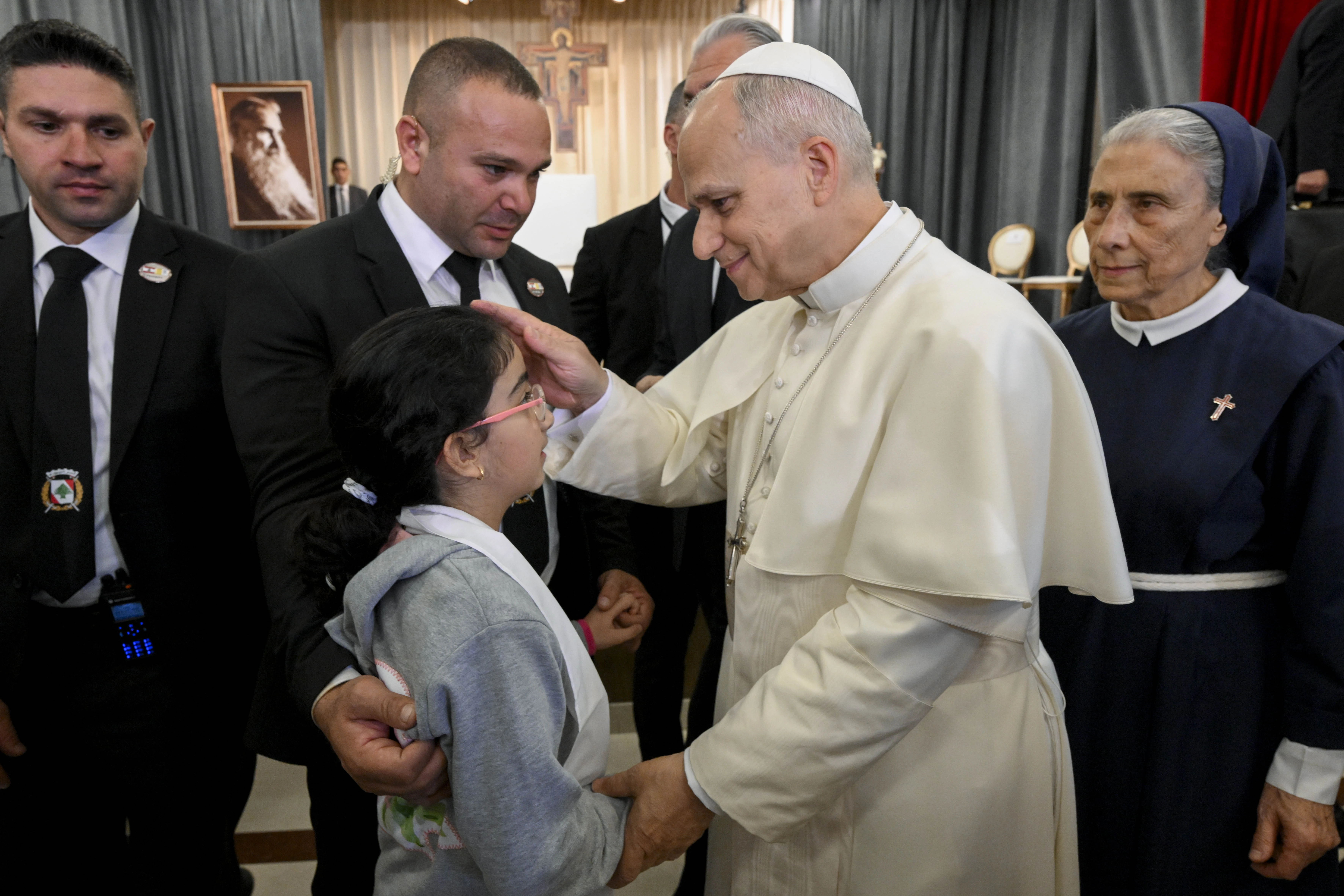 Pope Leo XIV blesses a child at the De La Croix Hospital for the mentally disabled in Jal el Dib, north of Beirut, Lebanon, on Dec. 2, 2025. | Credit: Vatican Media.