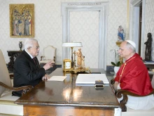Pope Leo XIV speaks with President Mahmoud Abbas of Palestine during a private audience in the Vatican’s Apostolic Palace on Nov. 6, 2025.
