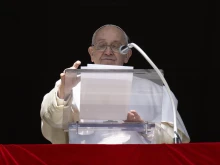 Pope Francis addresses pilgrims in St. Peter’s Square during his Sunday Angelus on Feb. 18, 2024.