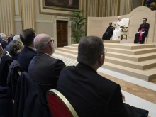 Pope Leo XIV speaks to people who work in Italy’s intelligence sector in the Vatican’s Hall of Blessings on Dec. 12, 2025.