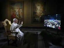 Pope Leo XIV greets young American Catholics from the Vatican during a digital dialogue held between the Holy Father and participants in the National Catholic Youth Conference in Indianapolis, Friday, Nov. 21, 2025