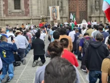 Hundreds of men pray in Santo Domingo Plaza on June 25 at the first-ever Men's Rosary in Mexico City.