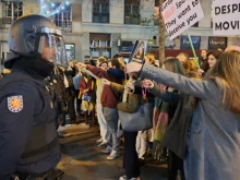 Spanish protesters show their rosaries in Spain in protest against the action of the police on Nov. 28, 2023.