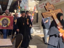 Christians processing through the Old City of Jerusalem.