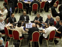 Father Ivan Montelongo, age 30 (seated at left), of El Paso, Texas, is one of 11 U.S. delegates to the Synod on Synodality.