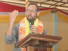 Father Christian Carlassare, Bishop-elect of Rumbek, speaks at Holy Family Cathedral, March 23, 2022.
