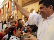 Father Luis Enrique Guillén.