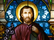Stained glass window depicting St. Joseph.