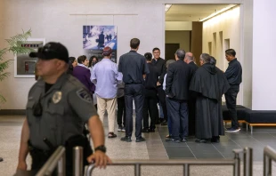 Clergy accompany migrants at a courthouse in San Diego. Credit: Photo courtesy of Father Scott Santarosa