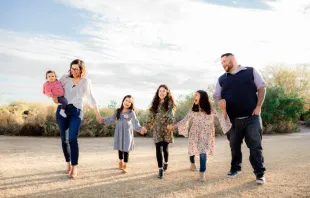 Jenna Guizar, her husband, and their four daughters. Photo   Sara Altair