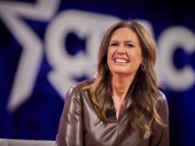 Arkansas Republican Gov. Sarah Huckabee Sanders speaks at the annual CPAC D.C. conference at the Gaylord National Resort in Oxon Hill, Maryland, on Saturday, Feb. 22, 2025.
