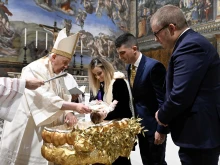 Pope Francis baptized 13 babies in the Sistine Chapel on Jan. 8, 2023.