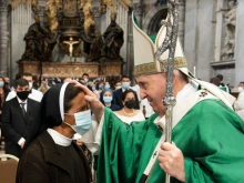 Pope Francis greets the recently freed Sister Gloria Cecilia Narváez Argoti at the Vatican, Oct. 10, 2021.