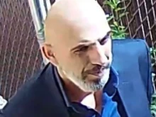 The priest impersonator enters American Martyrs Church in Queens, New York, on March 3, 2024.