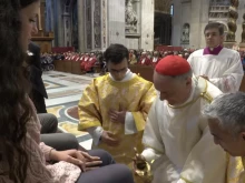 Cardinal Mauro Gambetti performs the washing of feet ritual for laypersons during the Holy Thursday Mass in St. Peter’s Basilica, Vatican City, April 17, 2025.