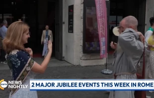 A jubilee attendee snaps a shot of a fellow jubilee-goer in Rome during a broadcast of “EWTN News Nightly,” Monday, July 28, 2025. Credit: “EWTN News Nightly”