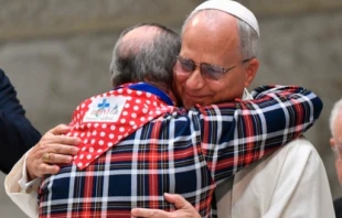 Pope Leo XIV hugs a man during the Jubilee of Roma, Sinti, and Travelers on Saturday, Oct. 18, 2025. Credit: Vatican Media