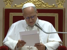 Pope Leo XIV addresses officials of the Roman Curia at the Vatican on December 22, 2025.