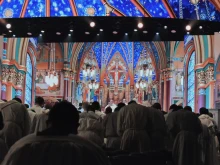 Priests bow during the consecration at the opening Mass at SEEK25 in Salt Lake City on Jan. 1, 2025.
