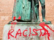 The statue of the Roman Catholic Spanish priest Junipero Serra is pictured in Palma de Mallorca on June 22, 2020, after it was daubed with graffiti reading "Racist." 