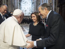 Pope Francis greets House Speaker Nancy Pelosi and Paul Pelosi in St. Peter's Basilica after Mass on June 29, 2022.