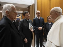 Pope Francis meets with Father Federico Lombardi, president of the Ratzinger Foundation and Vatican spokesman during Pope Benedict XVI’s pontificate (left), and the 2023 Ratzinger Prize recipients Father Pablo Blanco Sarto (center) and Professor Francesc Torralba (right) at the Vatican on Nov. 30, 2023.
