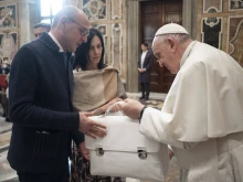 Pope Francis welcomes members of the Italian Association of Leather Chemists during an audience in the Clementine Hall of the Vatican Apostolic Palace on January 29, 2022.