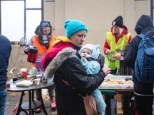 Refugees wait for trains at Lviv railway station in western Ukraine.