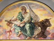 The painting St. Luke the Evangelist in the church Iglesia El Buen Pastor by Miguel Vaguer (1959).