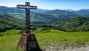 A cross stands in Montse Sole Historical Park in memorial of the victims of the massacres carried out there by Nazis in 1944.