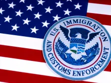 US Immigration and Customs Enforcement portrayed with the US flag. Via Shutterstock